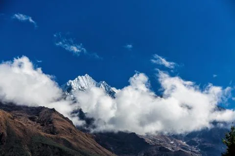 Mountain in the clouds Stock Photos