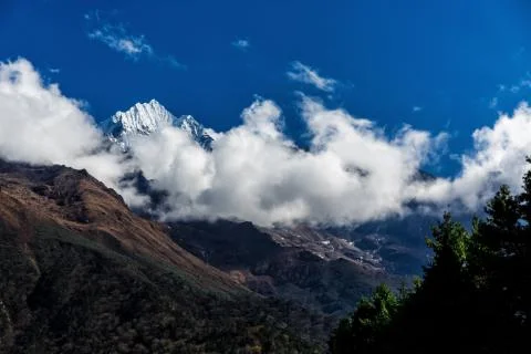 Mountain in the clouds Stock Photos
