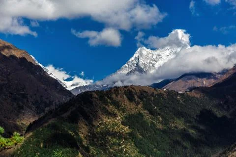 Mountain in the clouds Stock Photos