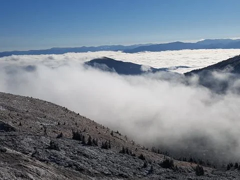 Mountain in the clouds Stock Photos