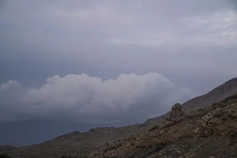 Mountain with clouds Stock Photos
