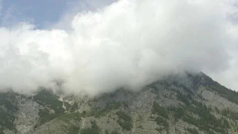 Mountain in the clouds summer time Stock Footage 82285530