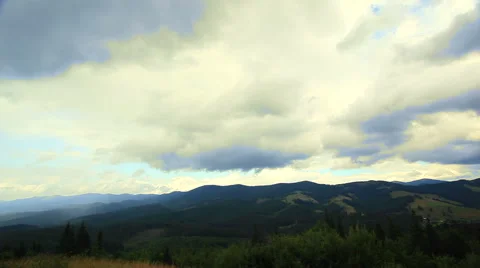 Mountain Clouds in yellow tones. Time lapse without birds Stock Footage 41727110