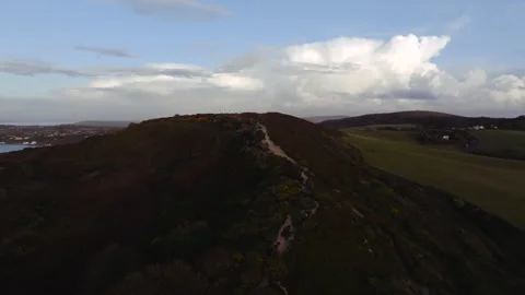 A mountain with a cloudy sky in the background Stock Footage 298287278