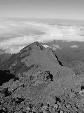 A mountain with a cloudy sky in the background Stock Photos
