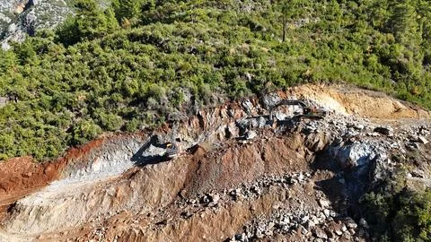 Mountain construction drone view coniferous forest Stock Photos