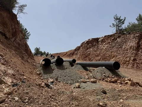 Mountain construction drone view coniferous forest Stock Photos