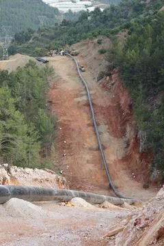 Mountain construction drone view coniferous forest Stock Photos