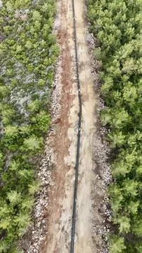 Mountain construction drone view coniferous forest Stock Photos