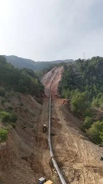 Mountain construction drone view coniferous forest Stock Photos