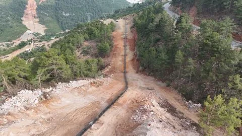 Mountain construction drone view coniferous forest Stock Photos