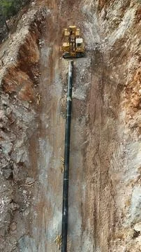 Mountain construction drone view coniferous forest Stock-Fotos