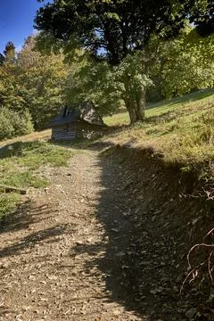 Mountain cottage Stock Photos