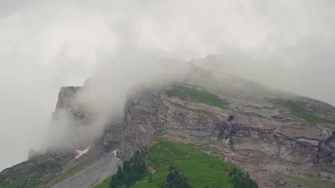 Mountain coverd in clouds Stock Footage 283342208