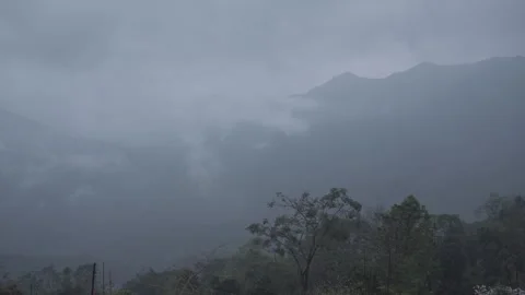 The mountain is covered in clouds. Video stock 305254462