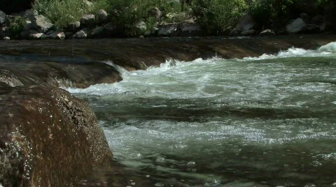 Mountain creek with tiny waterfall Stock Footage 488565
