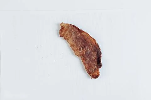 Mountain of cured meat with spices on a table Stock Photos