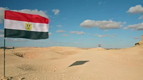 Mountain of the Dead and Egyptian Flag Siwa Oasis, Egypt Video stock 234576355
