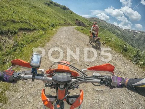 Mountain dirt Bike Enduro journey in high Caucasus mountains Stock Photos