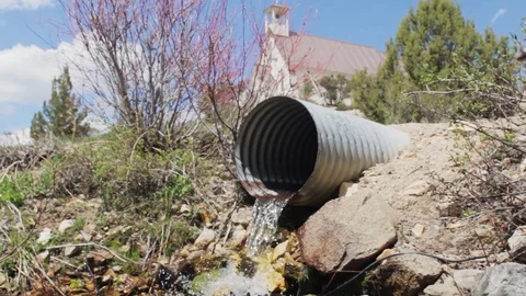 Mountain Drainage Pipe through Historic Town Video stock 89461687