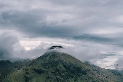 Mountain with dramatic sky in Scotland. Stock Photos