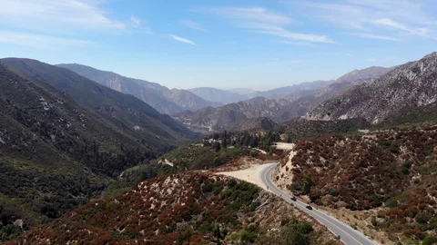 Mountain Drone Flight Along Highway 스톡 동영상 114765892
