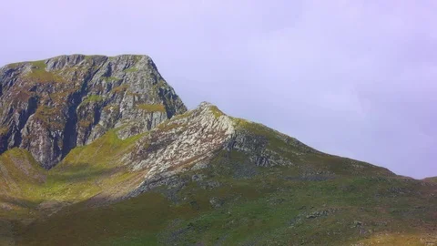 Mountain Edges on Grey Sky Видео 75577001