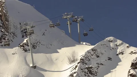 The Mountain Elevator Works At A Snow Slope Of The High Mountain Video stock 83438061