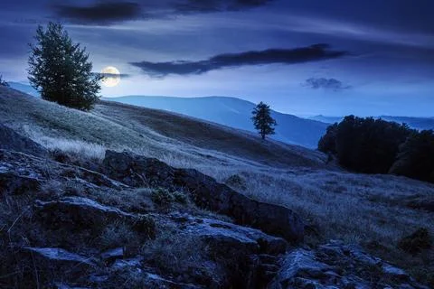 Mountain field at night Stock Photos