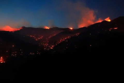 Mountain on fire Stock Photos