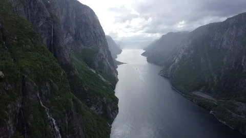Mountain fjord in clouds Video stock 239430475