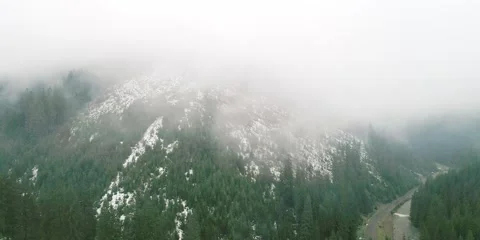 Mountain fog come down to valley village Stock Footage 281338465