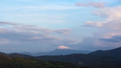 Mountain forest nature. Formation of clouds over the landscape in the blue sky Video stock 210231815