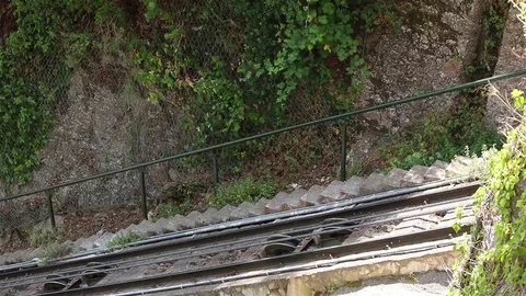 A mountain funicular going up Stock Footage 69098758