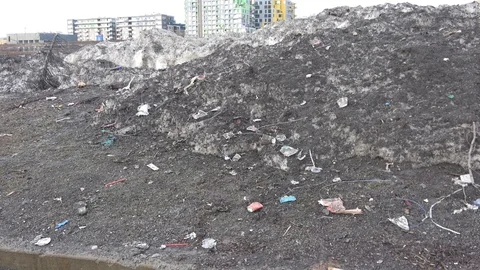 Mountain of garbage after snow melt , spring thaw Stock Footage 106605794