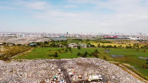 Mountain of garbage landfills with rag pickers collecting recyclable waste Stock Footage 297199051