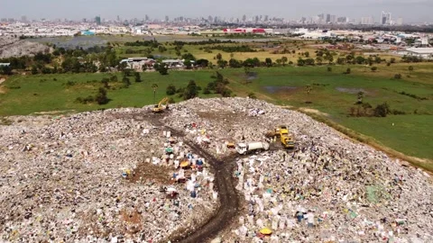 Mountain of garbage landfills with rag pickers collecting recyclable waste Stock Footage 297276997