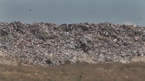 Mountain of garbage waste plastic bottles packages of rotting food Stock Footage 41454527