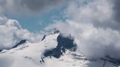 Mountain Glacier Peak clouds time lapse snowy vancouver bc whistler skiing s Stock Footage 277669178