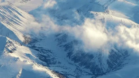 Mountain gorge behind the clouds Video stock 131376308