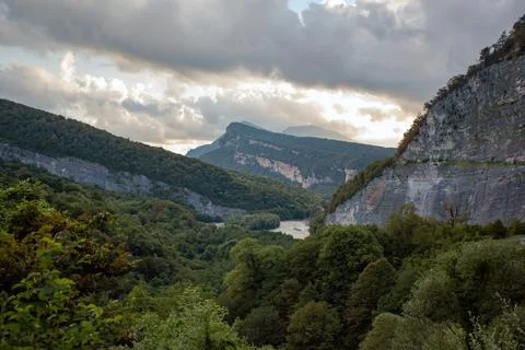 Mountain Gorge with river below Stock Photos