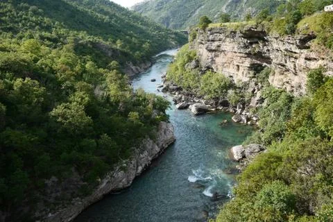 Mountain gorge with a river Stock Photos