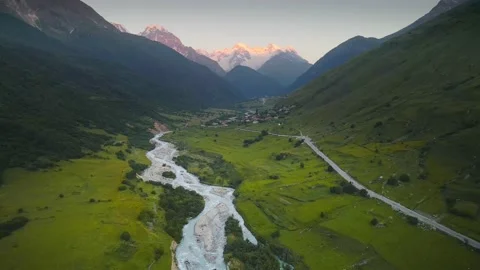 Mountain gorge with river at sunrise. Digor Gorge in North Ossetia, Russia. Stock Footage 232198631