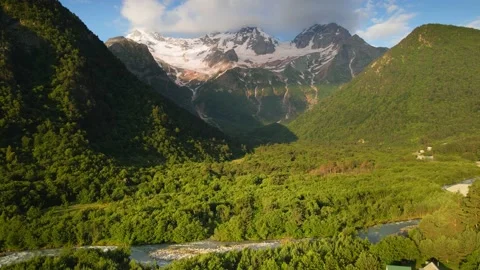 Mountain gorge with river at sunrise. Digor Gorge in North Ossetia, Russia. Video stock 232198769
