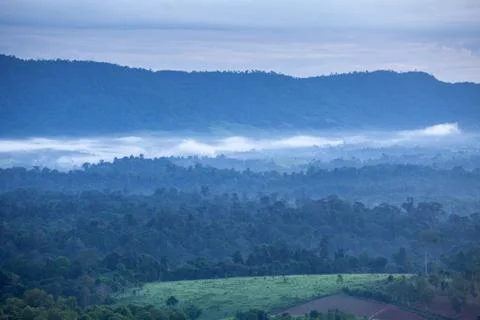 Mountain by green grass Stock Photos