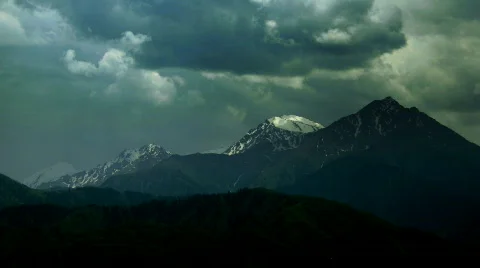 Mountain group with time-apse clouds Stock Footage 563488