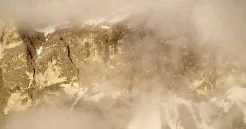 Mountain hidden in thick clouds in the Dolomites. Aerial of beautiful Sunset 스톡 동영상 132108088