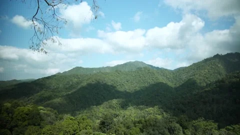 Mountain high views, bright sky, clouds shadows hit the forest on the mountain. Stock Footage 174639097
