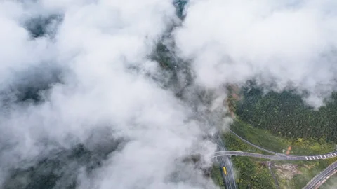 Mountain Highway Infrastructure Amidst Cloud Sea Time Lapse Stock Footage 320057304