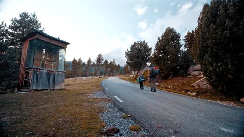 Mountain hikers exploring a scenic path in the Pyrenees of Spain Stock Footage 303634042